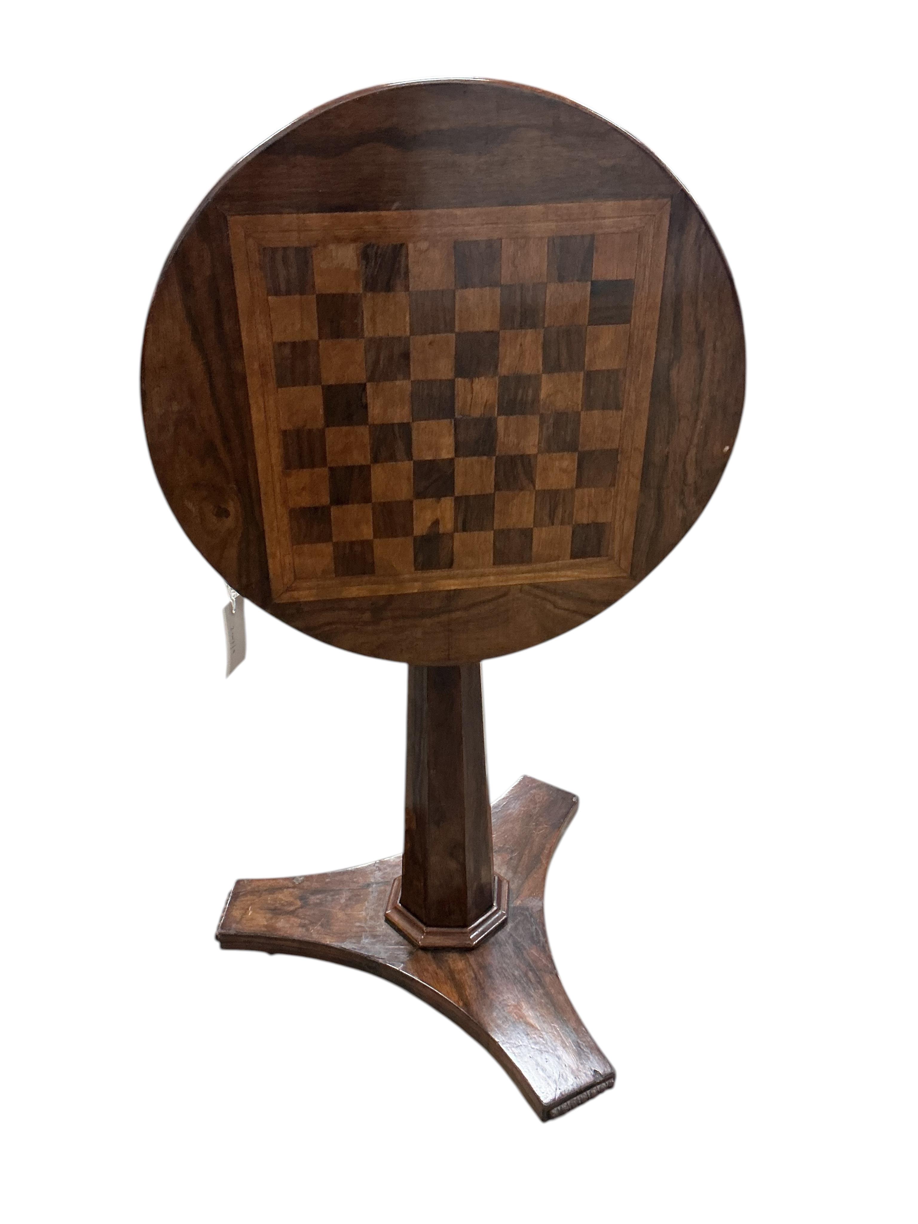 An early Victorian circular rosewood games table with chess board top, diameter 45cm, height 61cm
